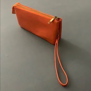Orange clutch wallet